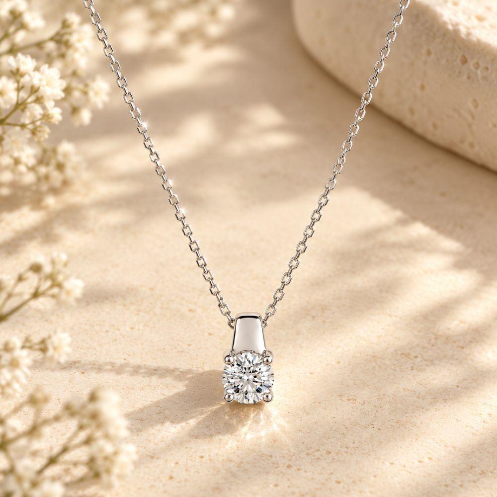 collier solitaire diamant or blanc 0.40 carats